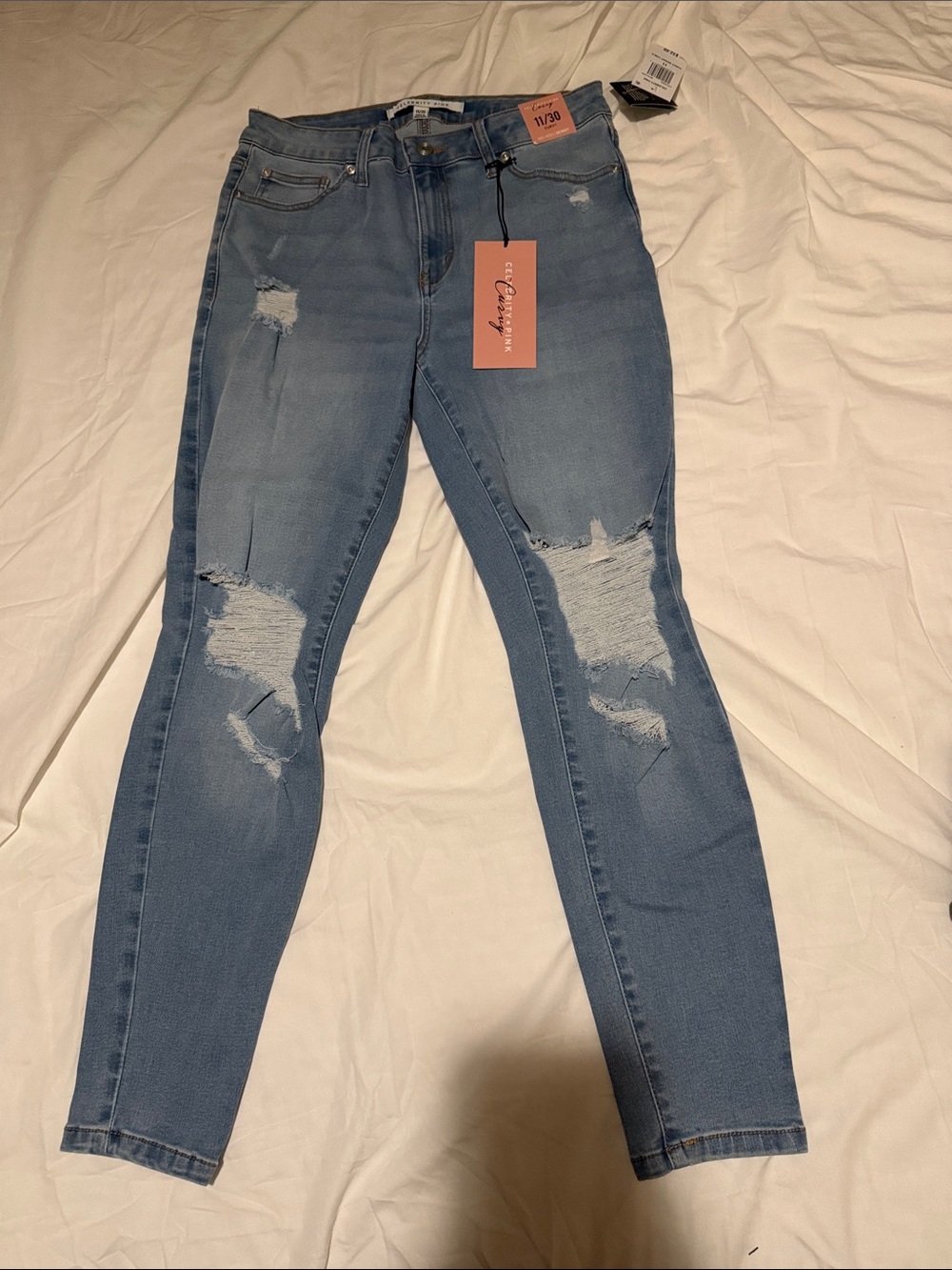 Celebrity Pink Light Blue Distressed Skinny Jeans